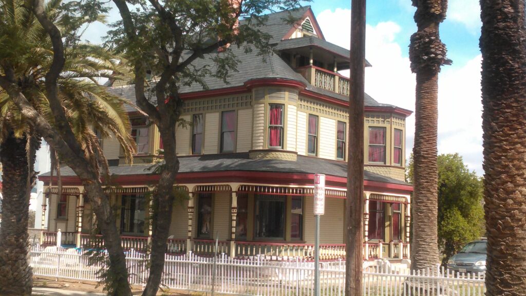 The Sweatt House in Riverside California during a historic preservation consultation documenting architectural features, restoration needs, and property conditions.